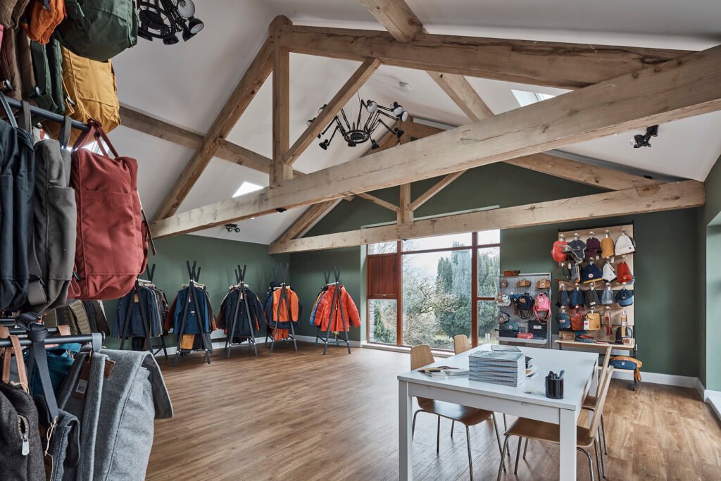 Interior of Billy's Space commercial unit in The Lake District with Fjallraven merchandise.